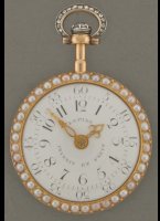 Gold enamelled case with pearls and diamonds, virgule-escapement, with original gold green enamelled chatelaine with pearl, key and lackstamp. Lpine number 2043. A similar watch withoud diamonds was given by Napoleon to Comtesse de la Bdoyre (collectie Chateaux de la Malmaison, see book 'Jean-Antoine Lpine, horloger 1720-1814' by Adolphe Chapiro). Diameter 38 mm. Box length 310 mm.