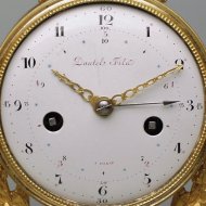 Rare 'directoire' and 'temps decimal revolutionnaire' A decorative, remarkable Directoire pendule with revolution decimal time 1-10 and normal time 1-12.
