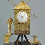 A remarkable, rare Empire table clock 