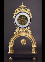 Gilded case, enamel dialplate with bleu ring. H=41cm, W=22cm