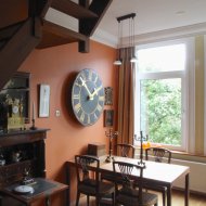 Antique dial of tower clock with gilded hands and working.