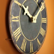 Antique dial of tower clock with gilded hands and working.