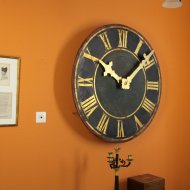 Antique dial of tower clock with gilded hands and working.