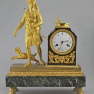 Gilded mantelclock, godess 'Diana' the hunters with sundial.