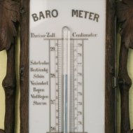 Black Forrest carved mercury barometer, 'Herm. Wiere, Frankfurt am Main'.