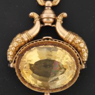 golden pocket watch key with citrine