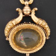 golden pocket watch key with citrine