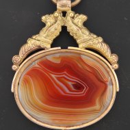 gilded pocket watch key with agate