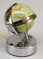 German electrical globe clock. Globe in english. The base has 2 dials, one for the minute and the other turns ones a year and shows the months, it also lets tilt the helm on the back, indicating the declination of the sun.
The clock runs by a synchrone motor on 220V, 50Hz.
The clock was made by Dietrich Reimer Verlag, Wilhelm Strasse 29, Berlin. This company was active until 1940.

height: 22cm
wide: 15 cm