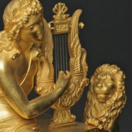 Firegilded french Orpheus and Euridice table clock. ca 1830