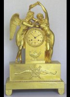 Mercury gilded mantel clock with Amor and Psyche. ca 1825