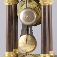 Brass casted french portico mantel clock in gothic style.