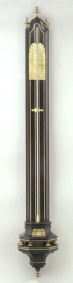 Important early french barometer (ca. 1690-1710) with family-crest of the Plasson-family in the old Forez province.
Ebony veneer with brass inlay, original console, brass adjustable plates, wooden mercury-reservoir.
On top of the crest is a miter and a staff, indicating Plasson was an abbot.