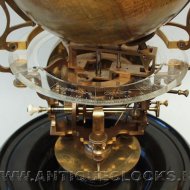 pendule Cosmographique 'Mouret de Ch. Henard & Cie a Paris' with world globe on top.